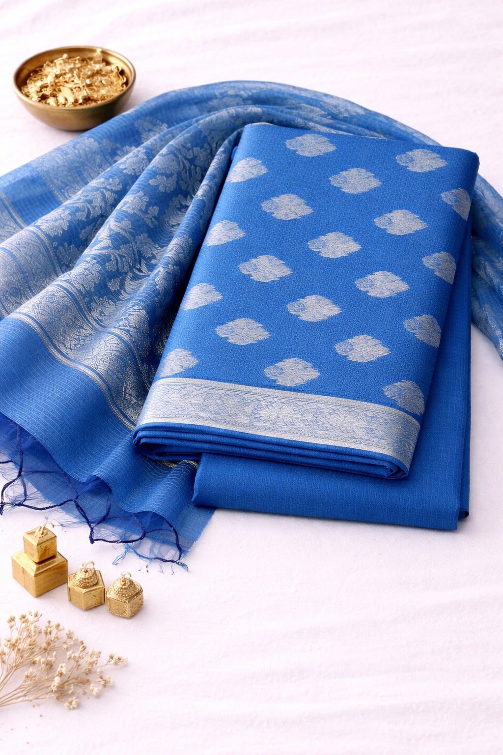 Blue Kurta material paired with dupatta having gold work
