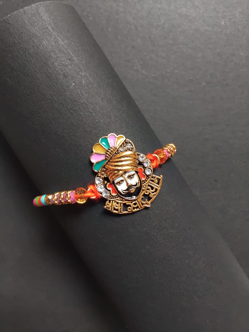 BUTTON CRYP Shyam Rakhi Multicolor for Happy Rakshabandhan – with Roli Chawal, Greeting Card and Chocolate