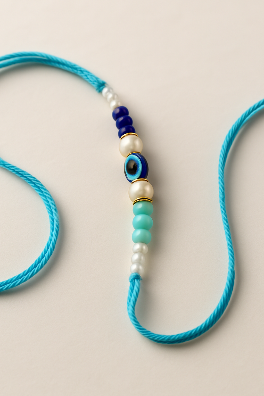 BUTTON CRYP Single Rakhi - Green, Turquoise and Yellow Stone Design |Best Rakhi for Brother 2025